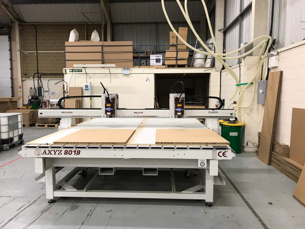 cnc machine cutting honeycomb paper cardboard