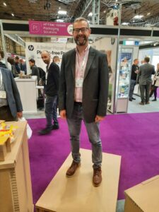 visitor to packaging innovations stand